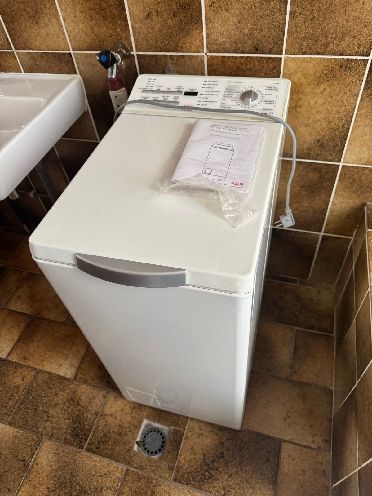 AEG Carat 47388 Bovenlader Wasmachine - 5kg A+, Witgoed en Apparatuur, Ophalen, 1200 tot 1600 toeren, Gebruikt, 4 tot 6 kg