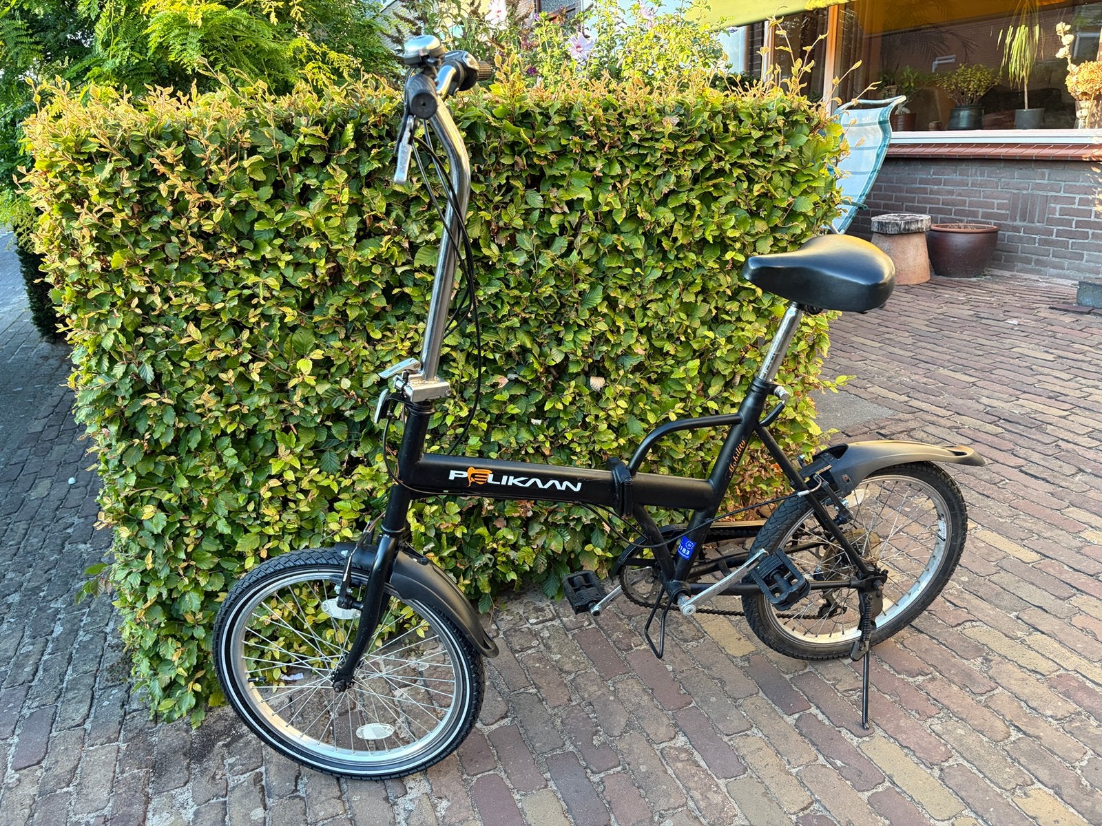 Vouwfiets merk Pelikaan kleur zwart, Ophalen, Gebruikt, 20 inch of meer, Versnellingen