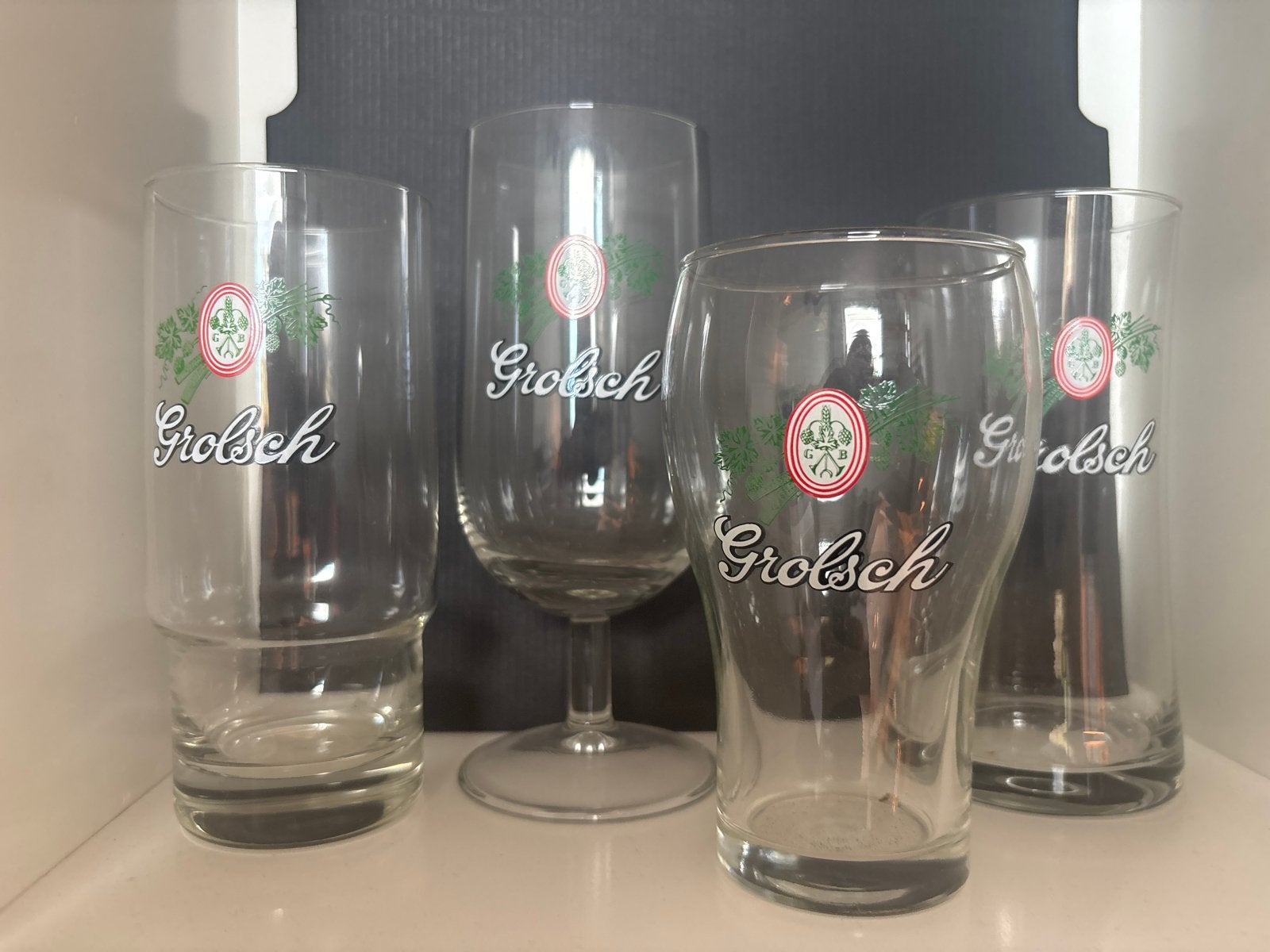 Set van 4 vintage Grolsch glazen (minimaal 35 jaar oud), Ophalen of Verzenden
