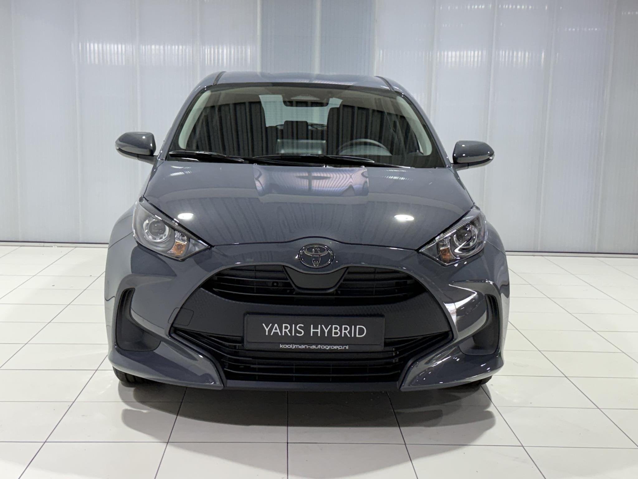 Toyota Yaris 1.5 Hybrid 115 Comfort € 2000 inruilpremie, S, Auto's, Stof, Euro 6, 116 pk, 1490 cc
