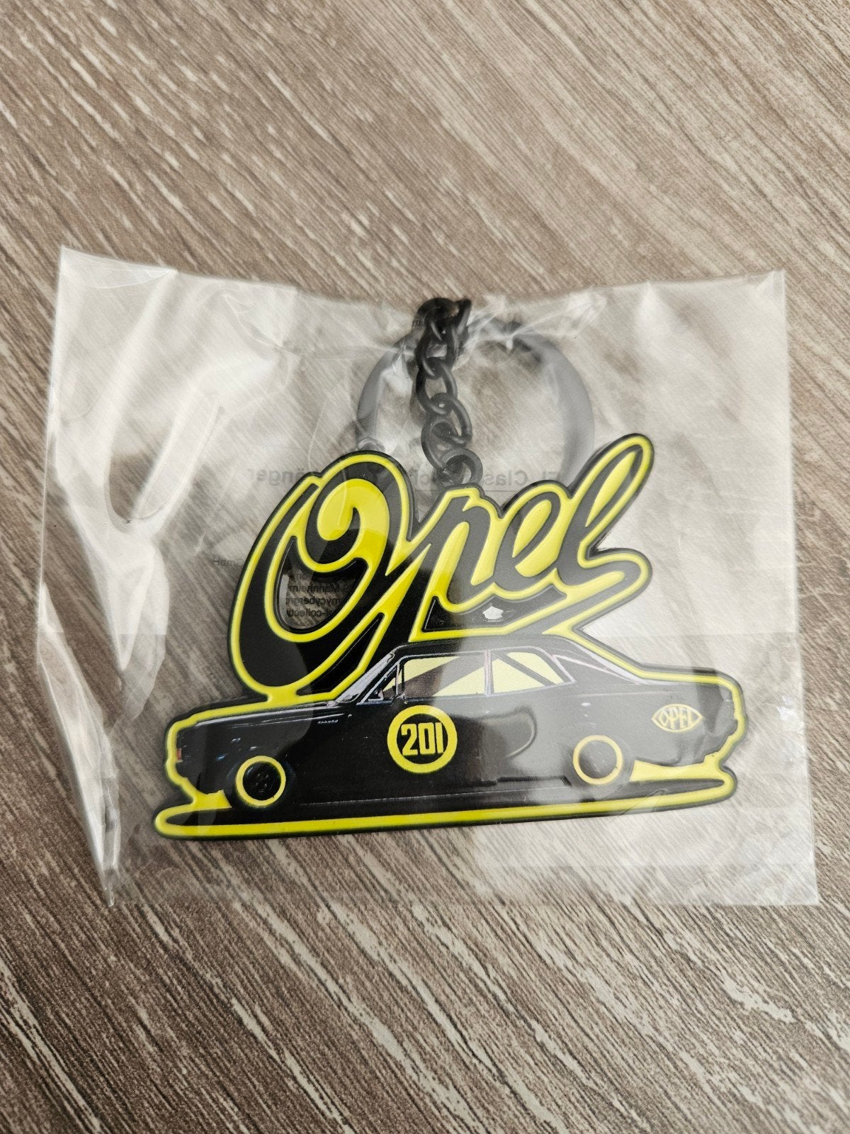 Opel sleutelhanger + Opel stickervel, Ophalen of Verzenden, Nieuw, Auto's
