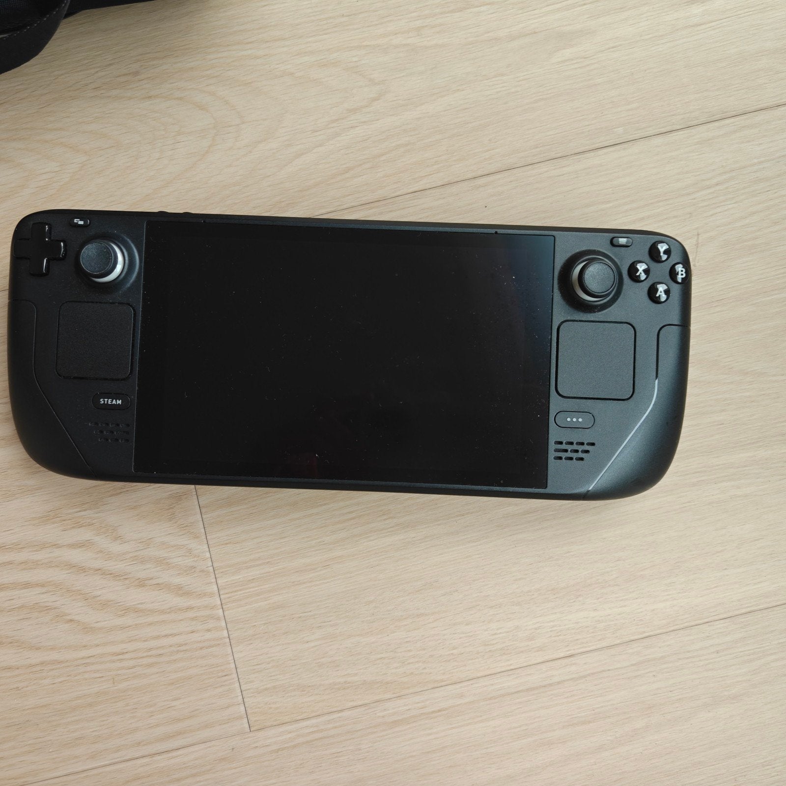 Foto 2 van Steam Deck 512GB (LCD) met hoes en accessoires