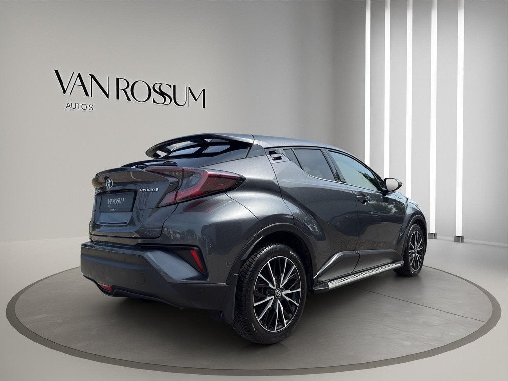 Toyota C-HR 1.8 Hybrid Executive | Navi | Camera | Half lede, Auto's, Toyota, Gebruikt, Euro 6, Leder en Stof, 122 pk