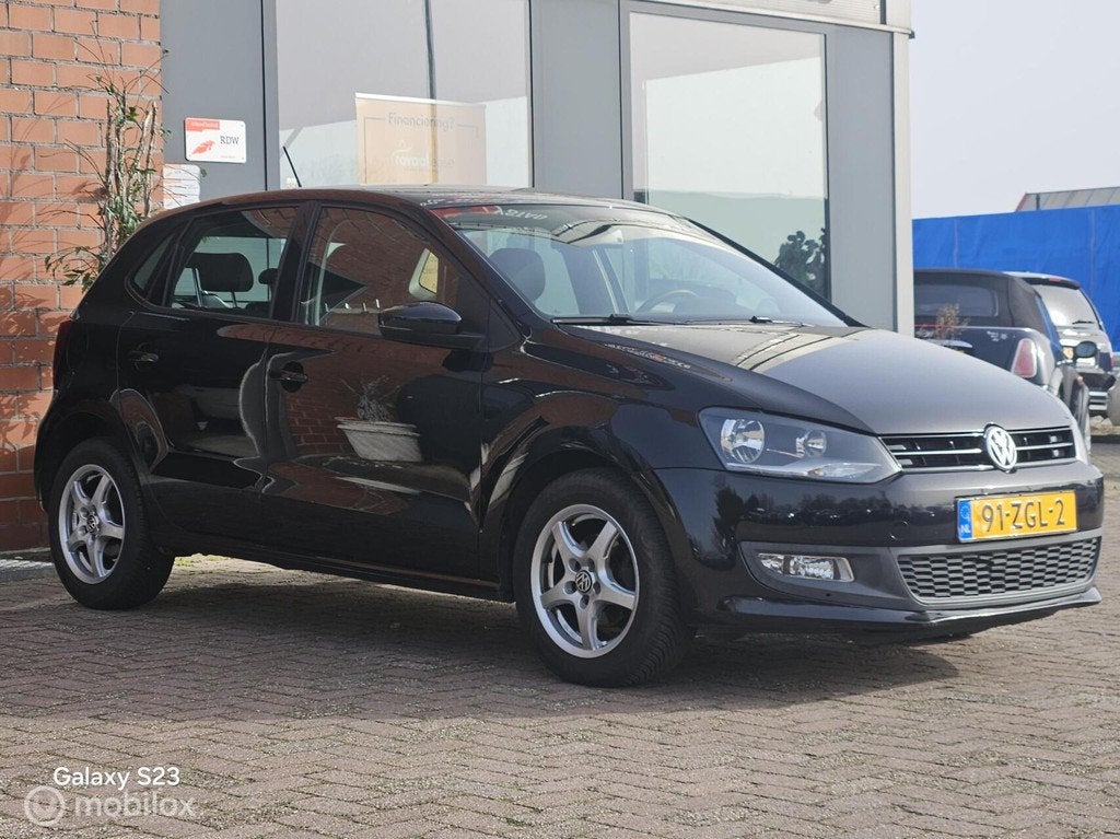 Volkswagen Polo 1.2 TSI BlueMotion 2e eigenaar Airco cruise, Auto's, Volkswagen, Voorwielaandrijving, Euro 5, 4 cilinders, Zwart