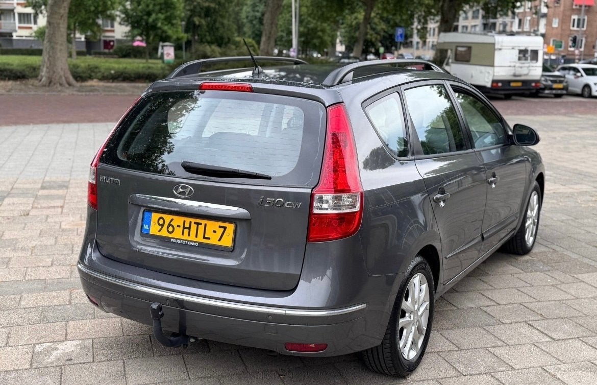 Hyundai i30 1.6 I Cvvt Crosswagon AUT 2009 Grijs, Auto's, 4 cilinders, Leder en Stof, I30, 126 pk