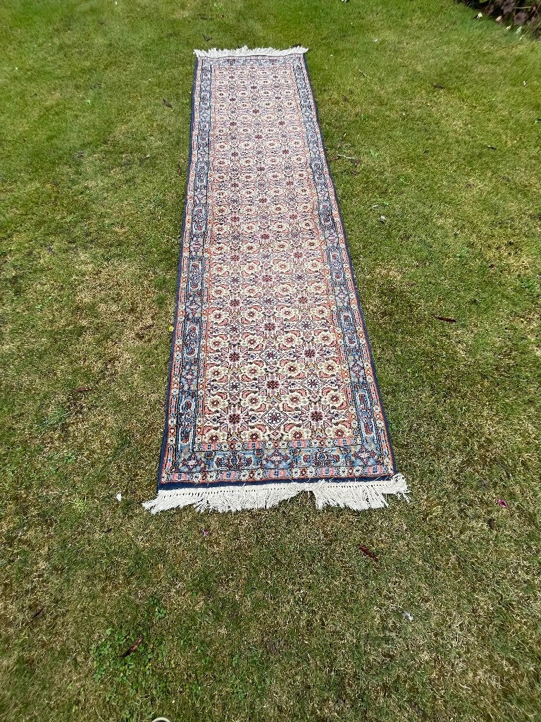 Perzisch/Oosters Tapijt of Loper, Ophalen