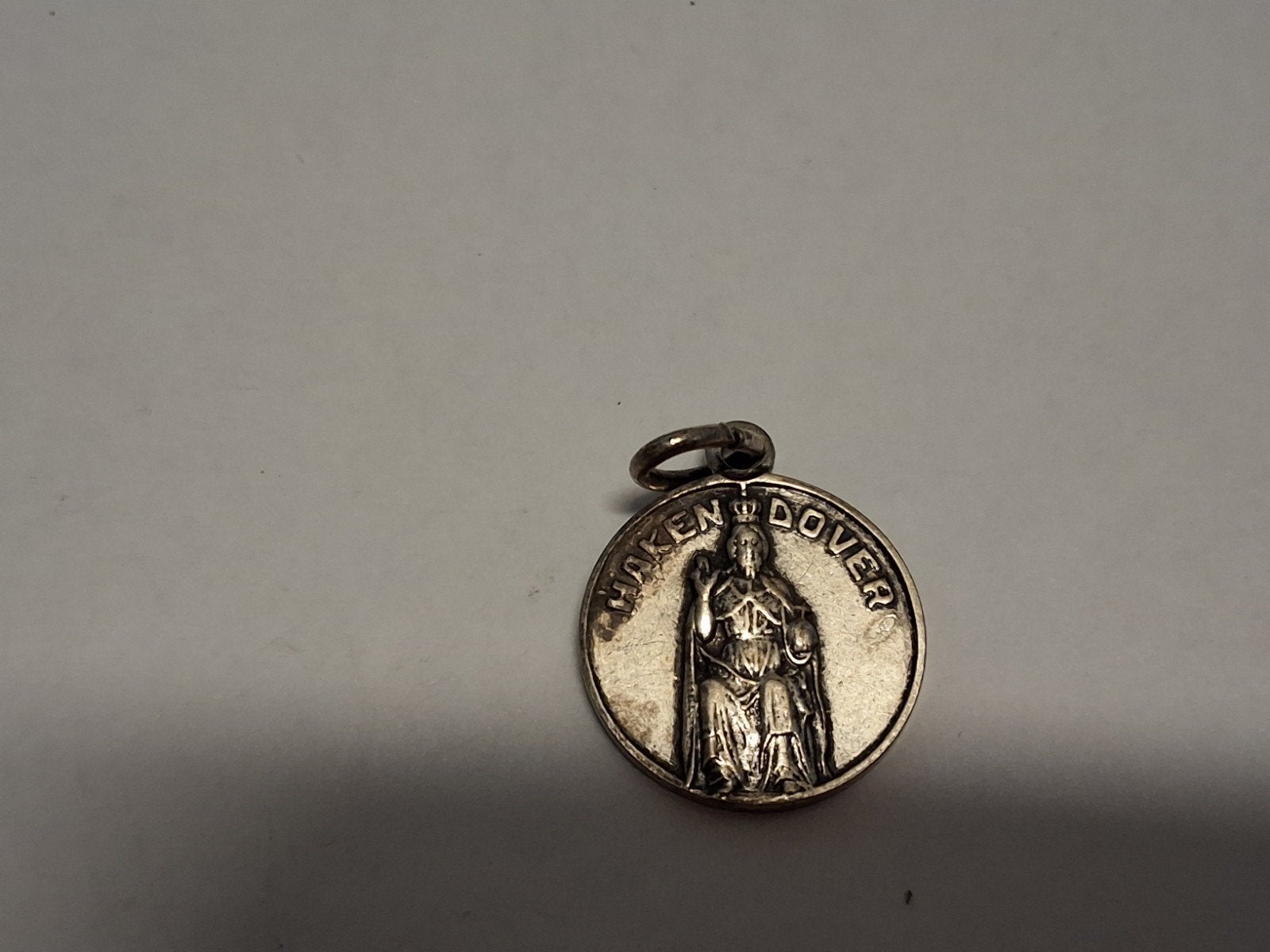 Antieke Belgische verzilverde katholieke medaille Hakendover, Ophalen of Verzenden