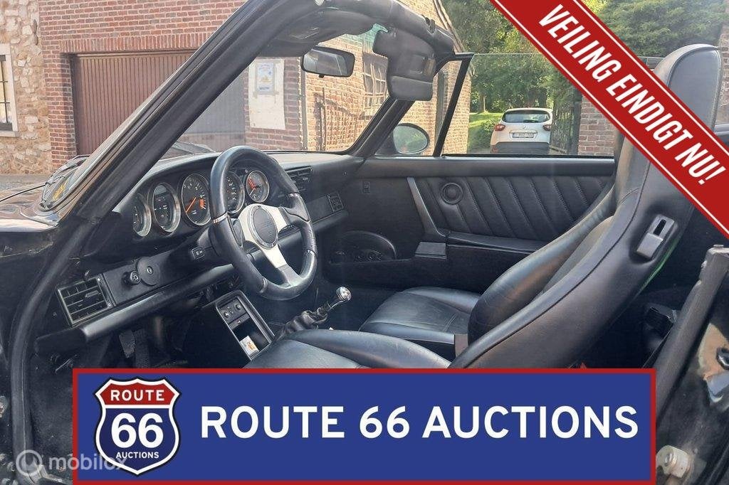 Porsche 911 Carrera Cabriolet | 1986 | Route 66 Auctions, Auto's, Oldtimers, Overige carrosserieën, Zwart, Bedrijf, Porsche