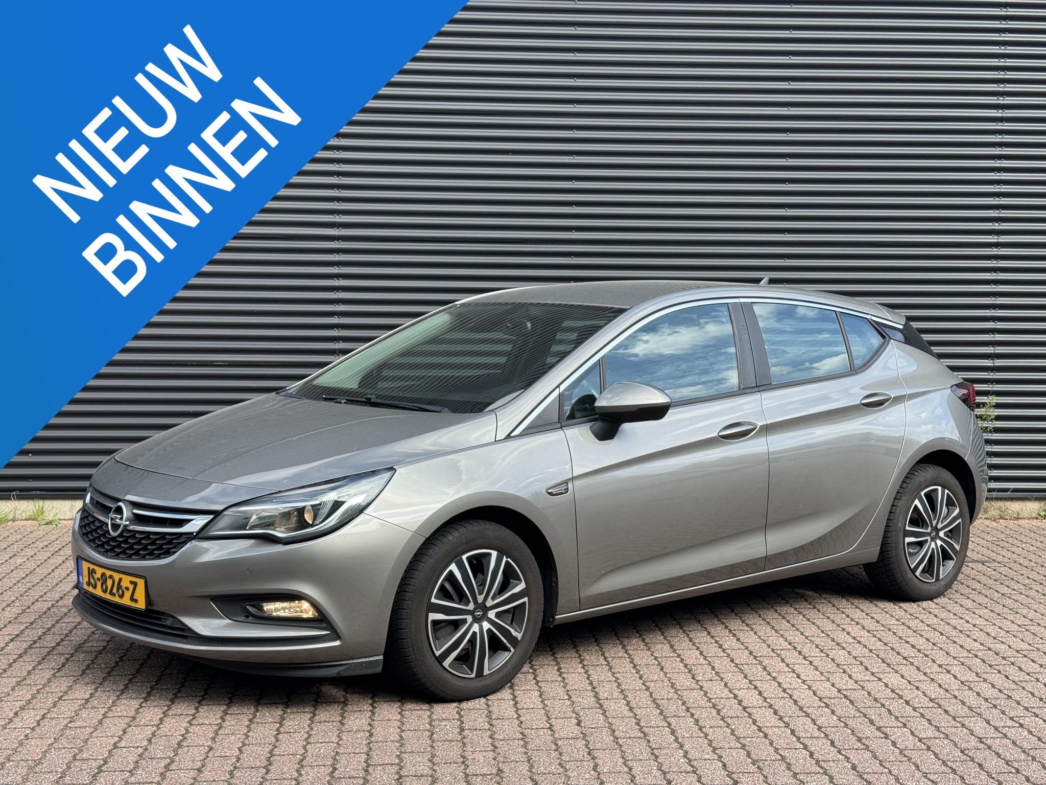 Opel Astra 1.0 Business+ NAP/OrgNL /Navigatie/Airco/, Stof, Gebruikt, Bruin, 610 kg