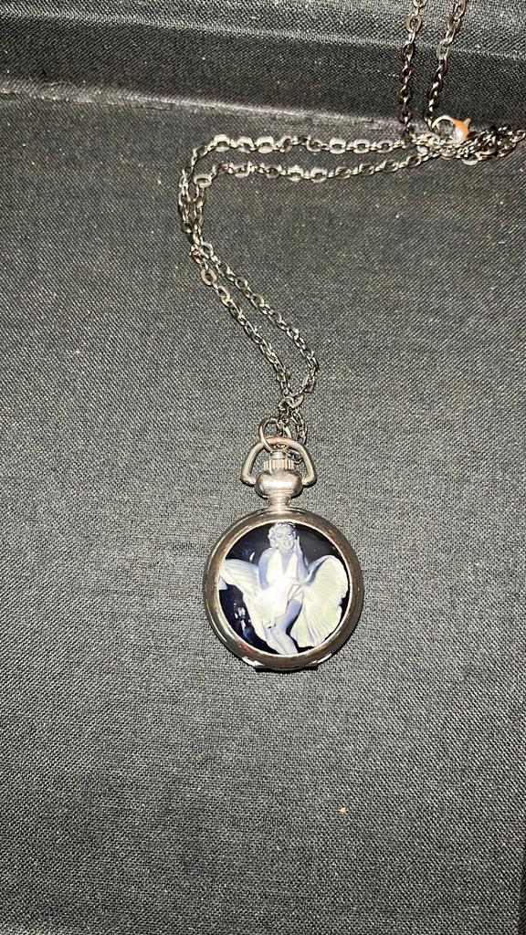 Marilyn Monroe    Horloge aan lange ketting., Ophalen of Verzenden, Gebruikt, Gebruiksvoorwerp