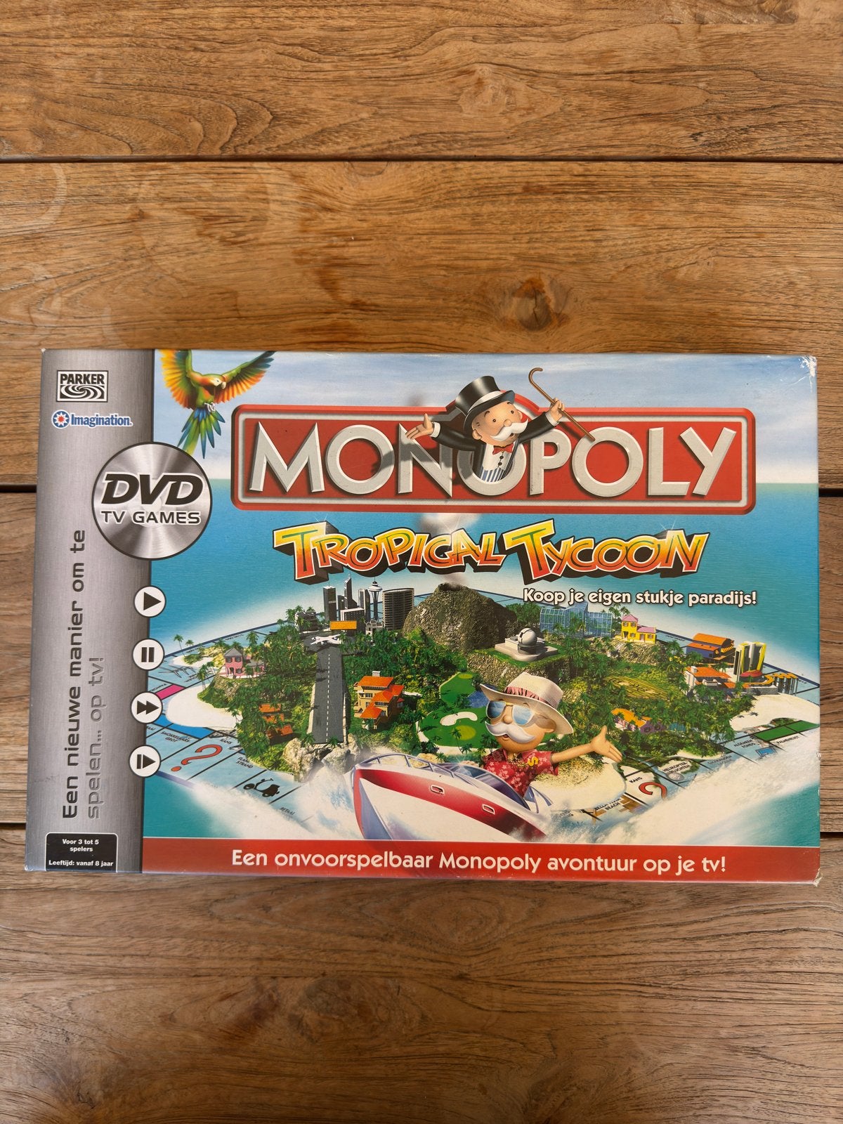 Monopoly Tropical Tycoon met DVD – compleet – Hasbro 2007, Ophalen of Verzenden, Zo goed als nieuw