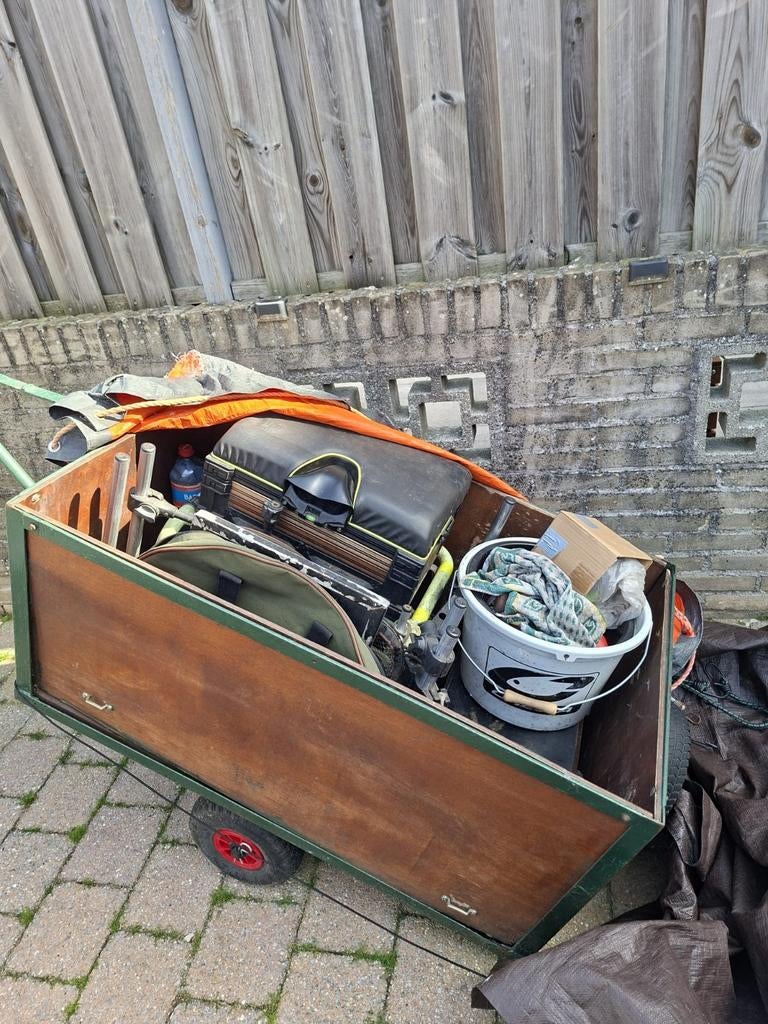 Kar voor achter de scooter of fiets, Ophalen