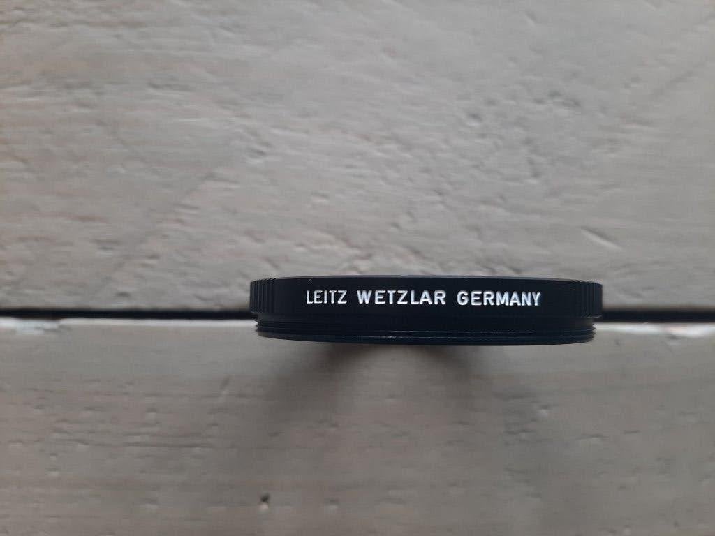 Leica / Leitz UVa 55 mm filter in nieuwstaat (type 13373), Overige merken, Inclusief opbergcase, UV-filter, Ophalen of Verzenden
