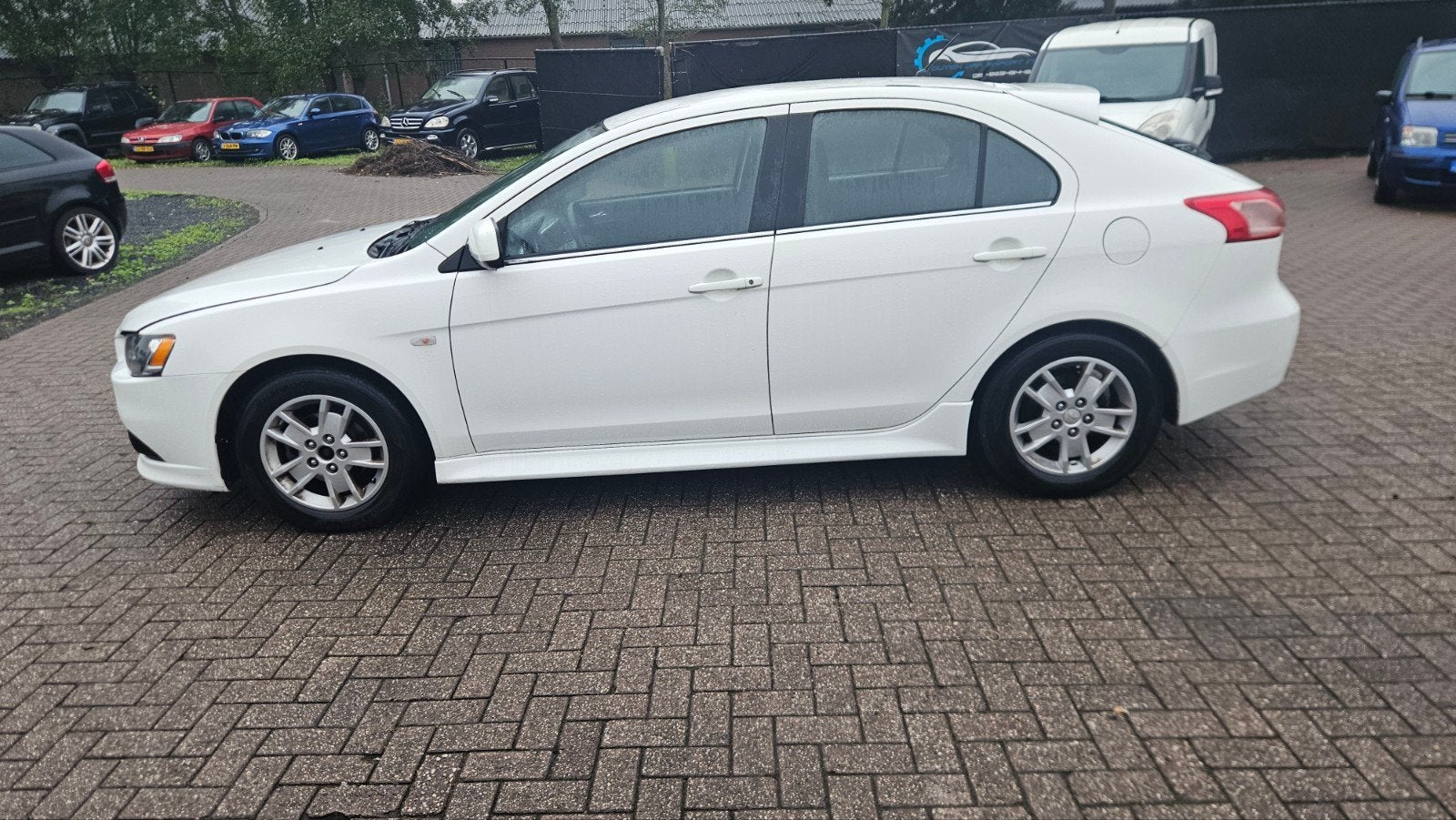 Mitsubishi Lancer 1.6 Cleartec Sportback 2014 Wit, Auto's, Voorwielaandrijving, Stof, Zwart, 4 cilinders