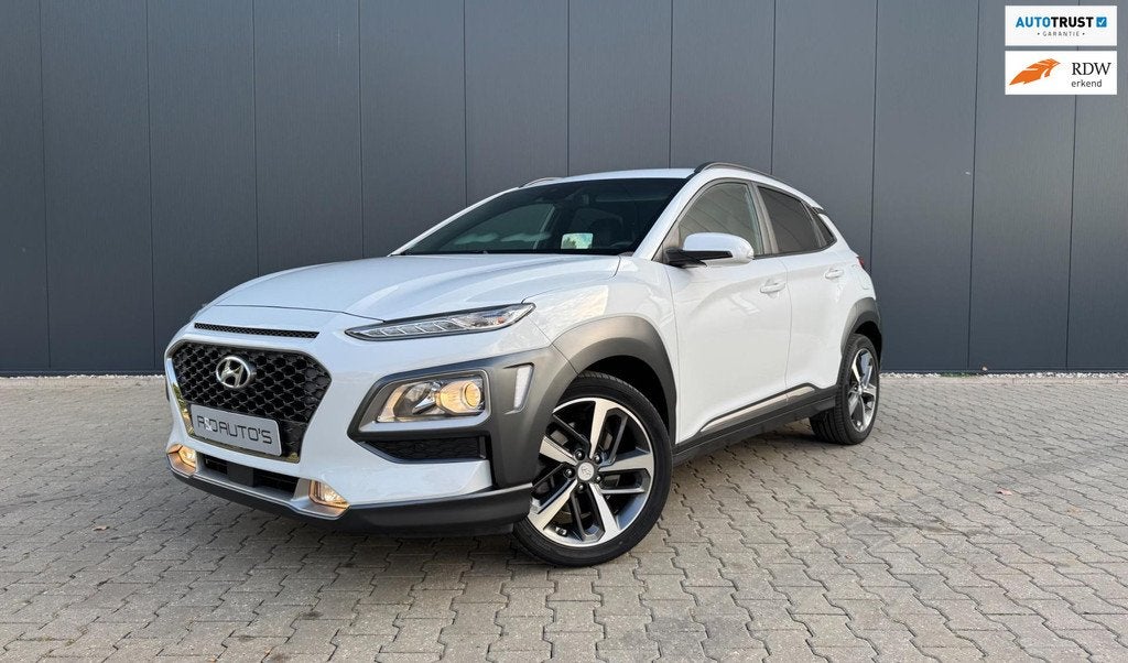 Hyundai Kona 1.6 LT TCI/GDI HEV Premium 4x4 Sport int. vele, Auto's, Automaat, Gebruikt, Zwart, Leder en Stof