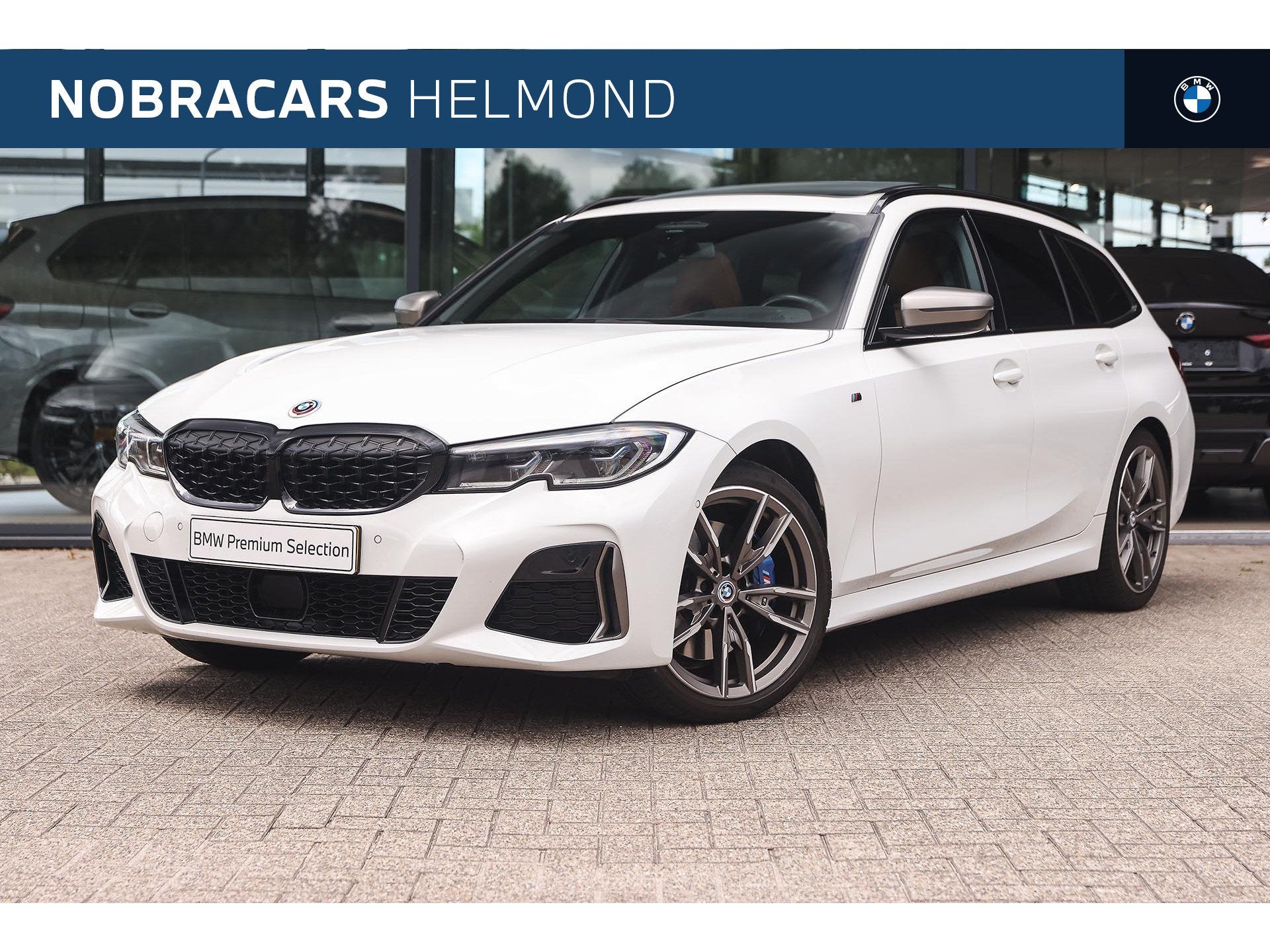 BMW 3 Serie Touring M340i xDrive Automaat / Panoramadak / M, 1780 kg, Lederen bekleding, Met garantie (alle), Wit