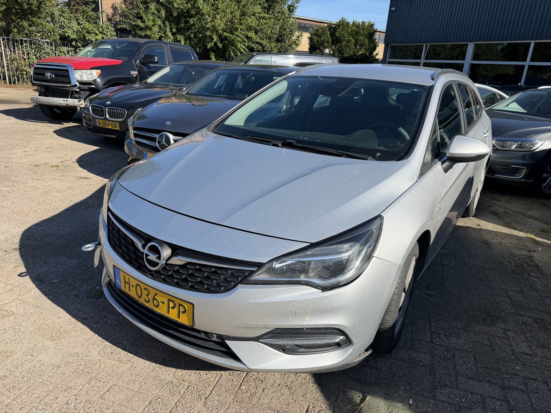 Opel Astra Sports Tourer 1.2 Business Edition MOTORSCHADE, Auto's, Voorwielaandrijving, Gebruikt, Euro 6, 1199 cc