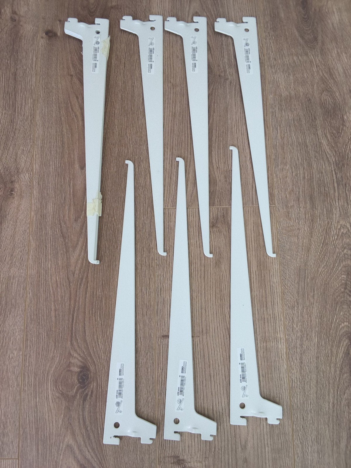 Wandplankensysteem: plank, dragers en rails, Ophalen