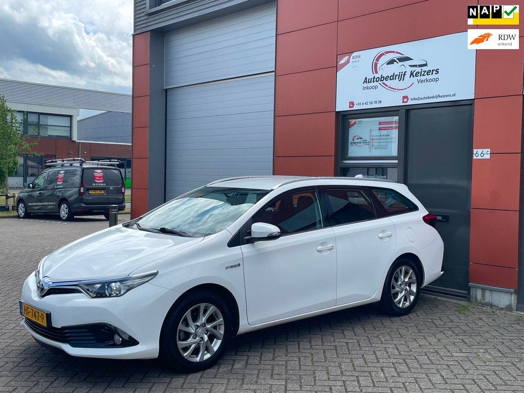 Toyota Auris Touring Sports 1.8 Hybrid Aspiration APK NAP CA, Auto's, Gebruikt, Euro 6, Wit, Origineel Nederlands
