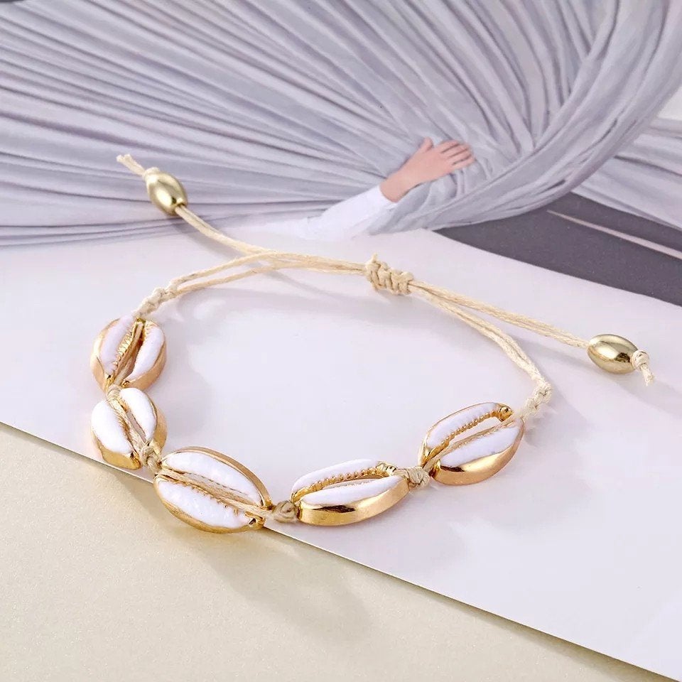Kauri schelp armbandje wit/goud, Overige materialen, Overige kleuren, Verzenden, Nieuw