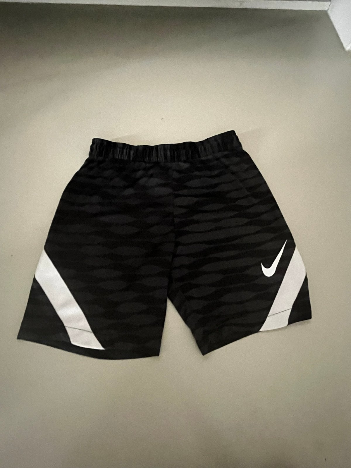 Nike sportbroekje zwart met wit, maat 134, Maat XS of kleiner, Ophalen, Gebruikt, Broek