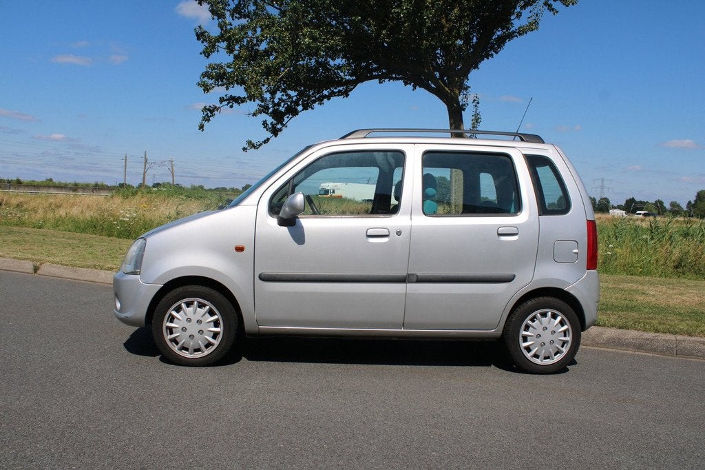 Opel Agila 1.2-16V Flexx cool Airco, Auto's, Opel, Voorwielaandrijving, Metallic lak, Stof, 4 cilinders