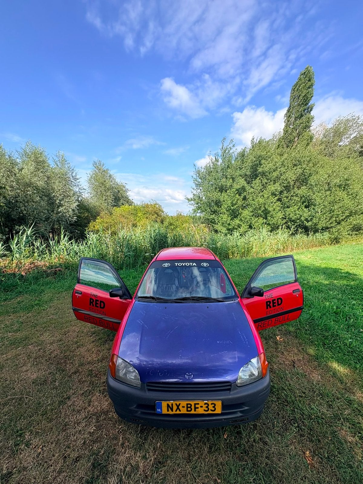 Toyota Starlet 1.3 16V AUT 1996 Rood, Auto's, Toyota, Automaat, 4 cilinders, Starlet, 400 kg