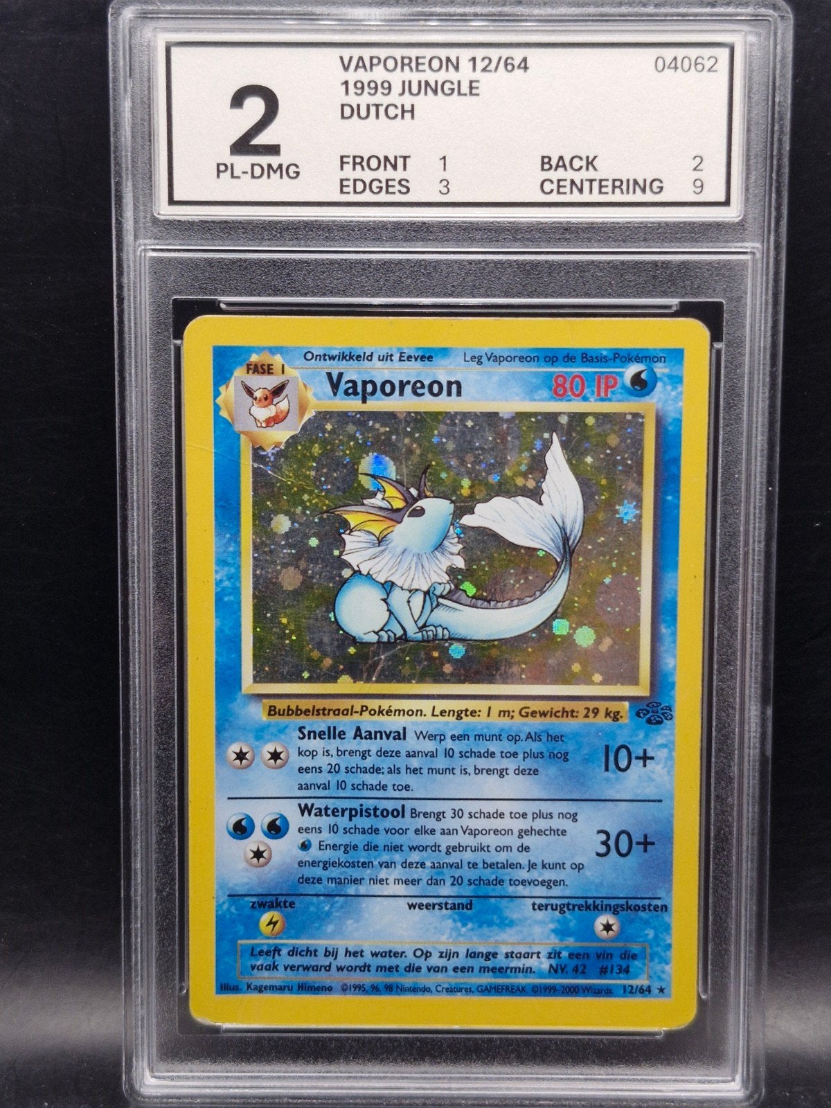 Vaporeon 1999 base jungle #12 woetoe Grading 2, Verzenden, Gebruikt, Losse kaart