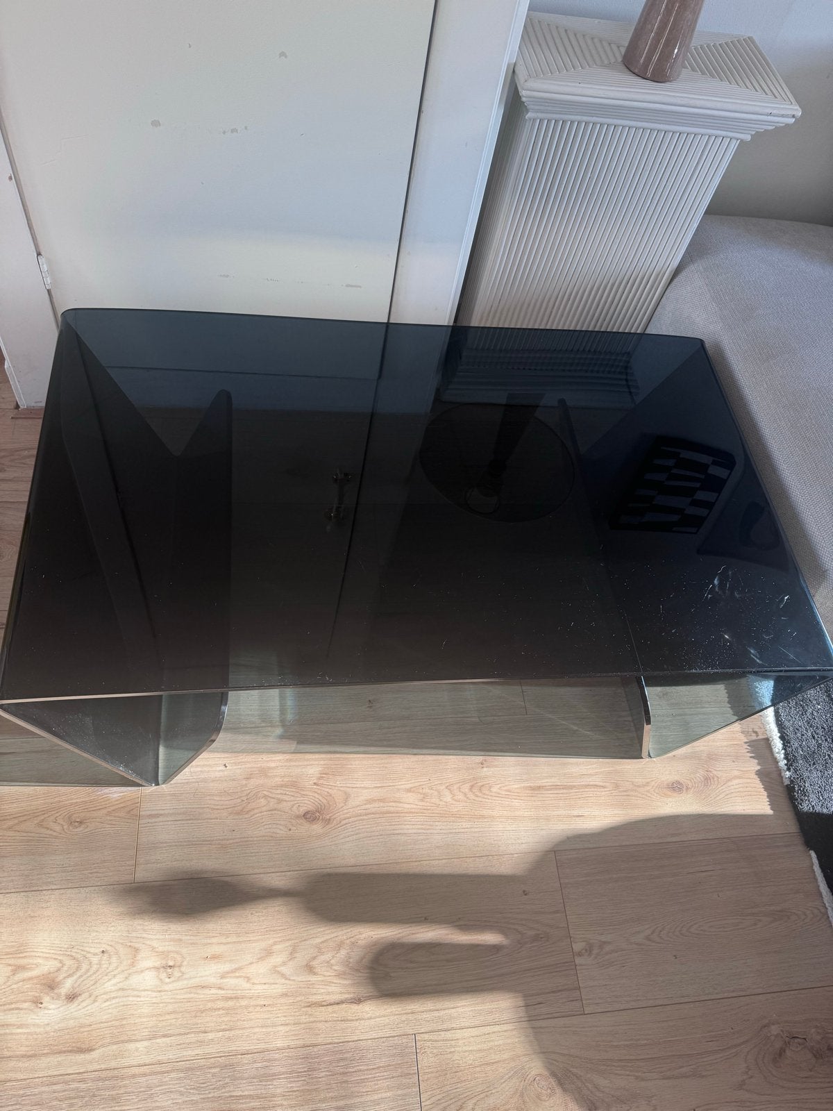 Zwarte glazen salontafel, Ophalen, Gebruikt, 100 tot 150 cm, 50 tot 100 cm