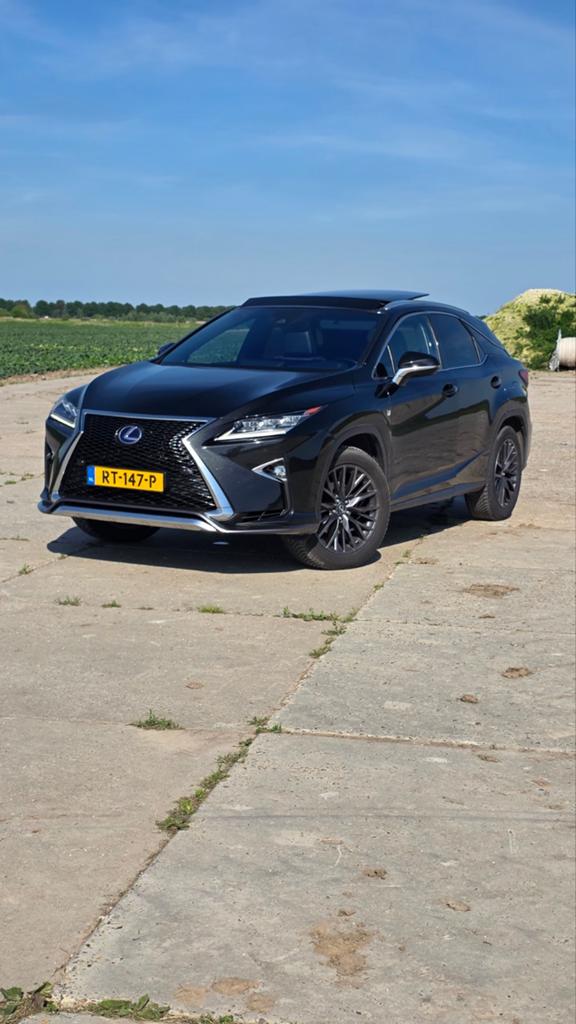 Lexus RX450H F-Sport 3.5 V6 Hybrid 4WD CVT Zwart, Auto's, Lexus, Automaat, Lichtsensor, Zwart, 2000 kg