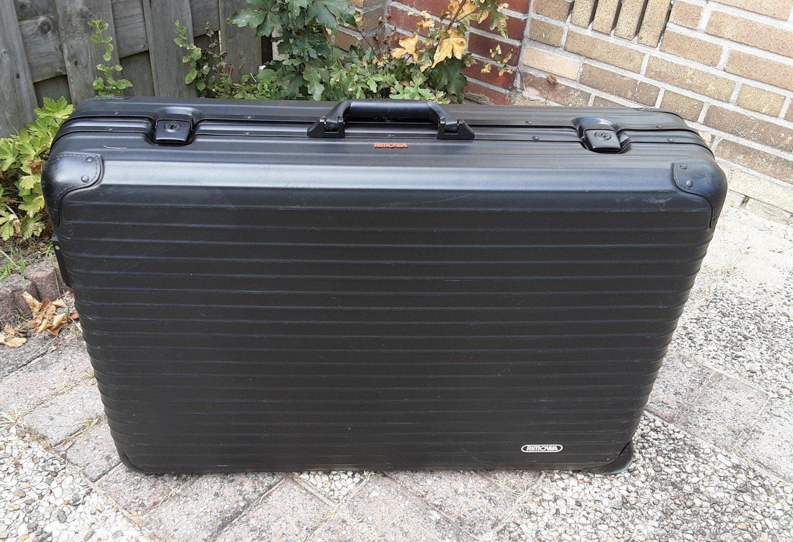 Rimowa Koffer Zwart - Stevige Reiskoffer met Wieltjes, Sieraden, Tassen en Uiterlijk, Koffers, Wieltjes, Gebruikt, Ophalen of Verzenden