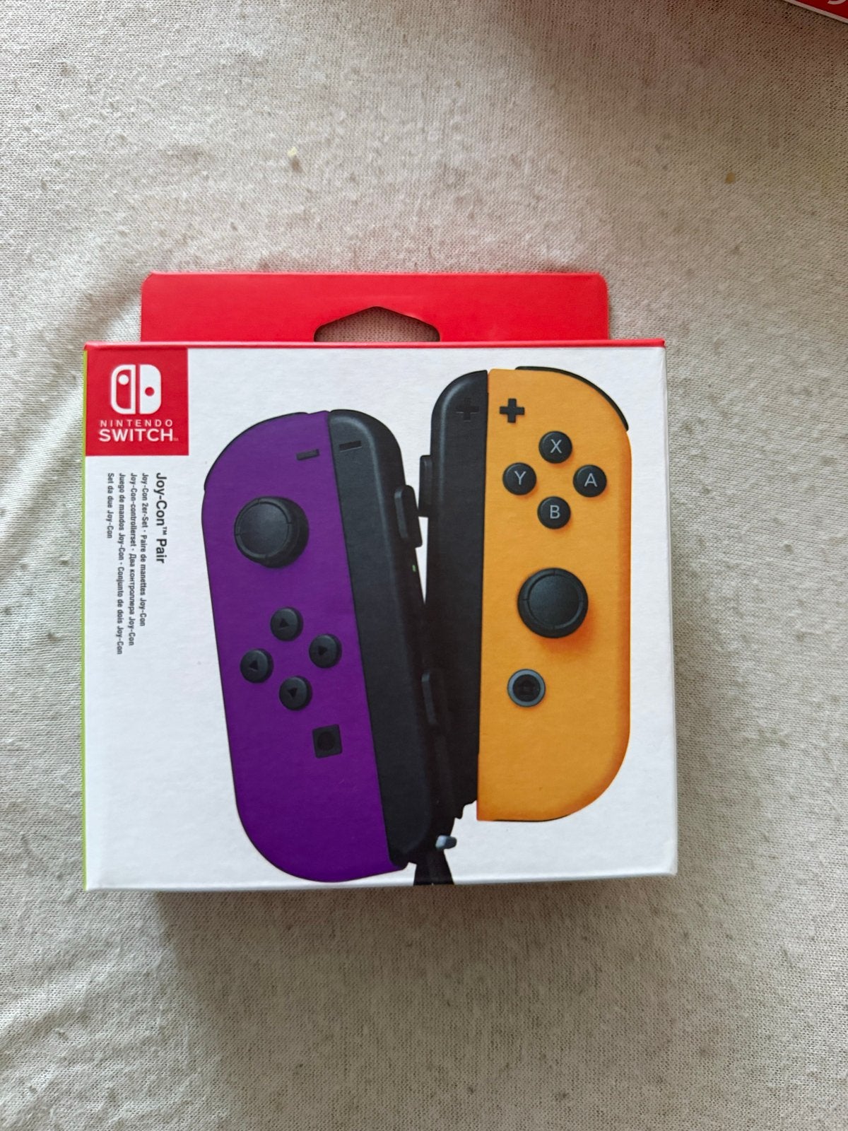 Nintendo Switch Joy-Con-set - Paars en Oranje, Spelcomputers en Games, Overige controllers, Nieuw, Ophalen of Verzenden, Draadloos