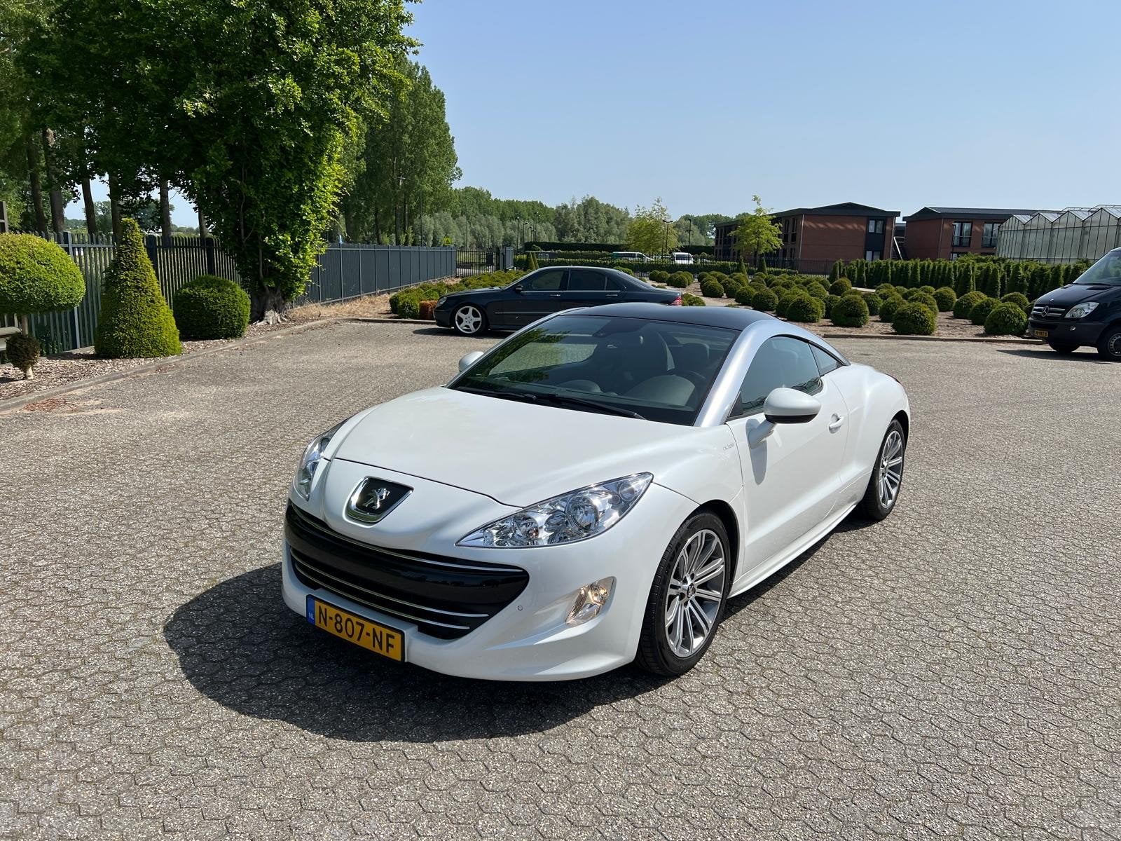 Peugeot RCZ 1.6 THP 2011 Parelmoer wit, Auto's, Voorwielaandrijving, Euro 5, 15 km/l, 4 stoelen
