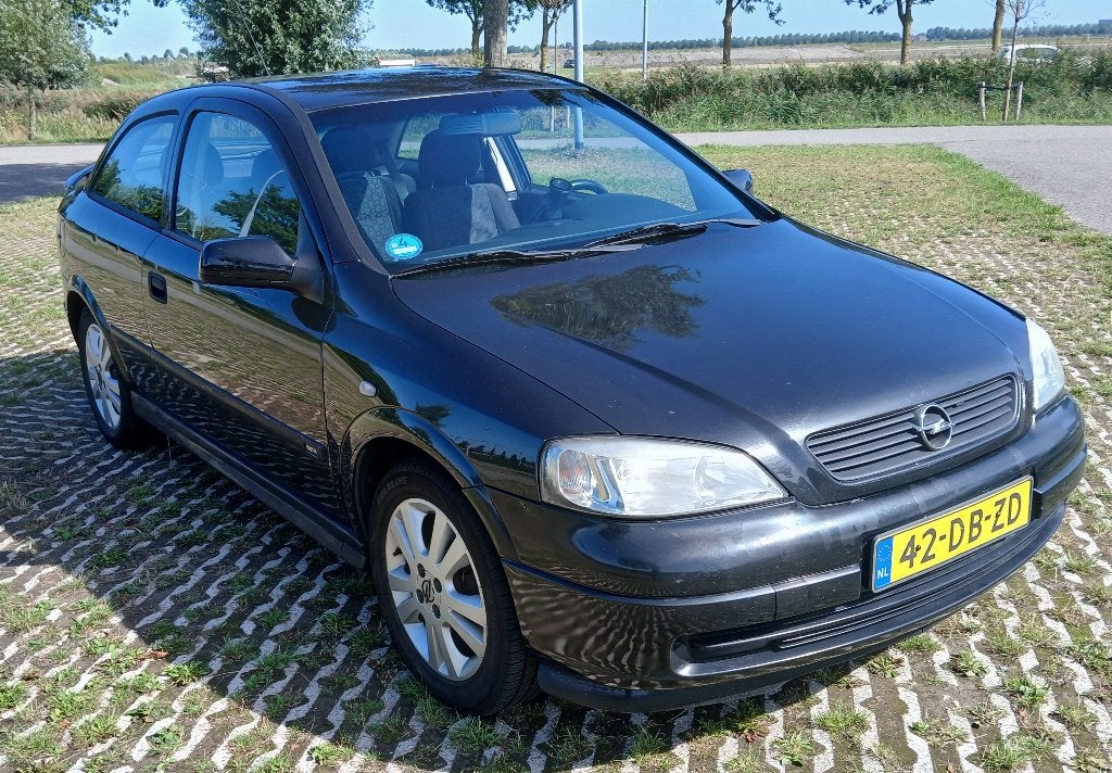 Opel Astra G 1.6-16v/100 jaar editie/101pk/Airco/Bluetooth, Auto's, Opel, Voorwielaandrijving, Stof, 4 cilinders, Handgeschakeld