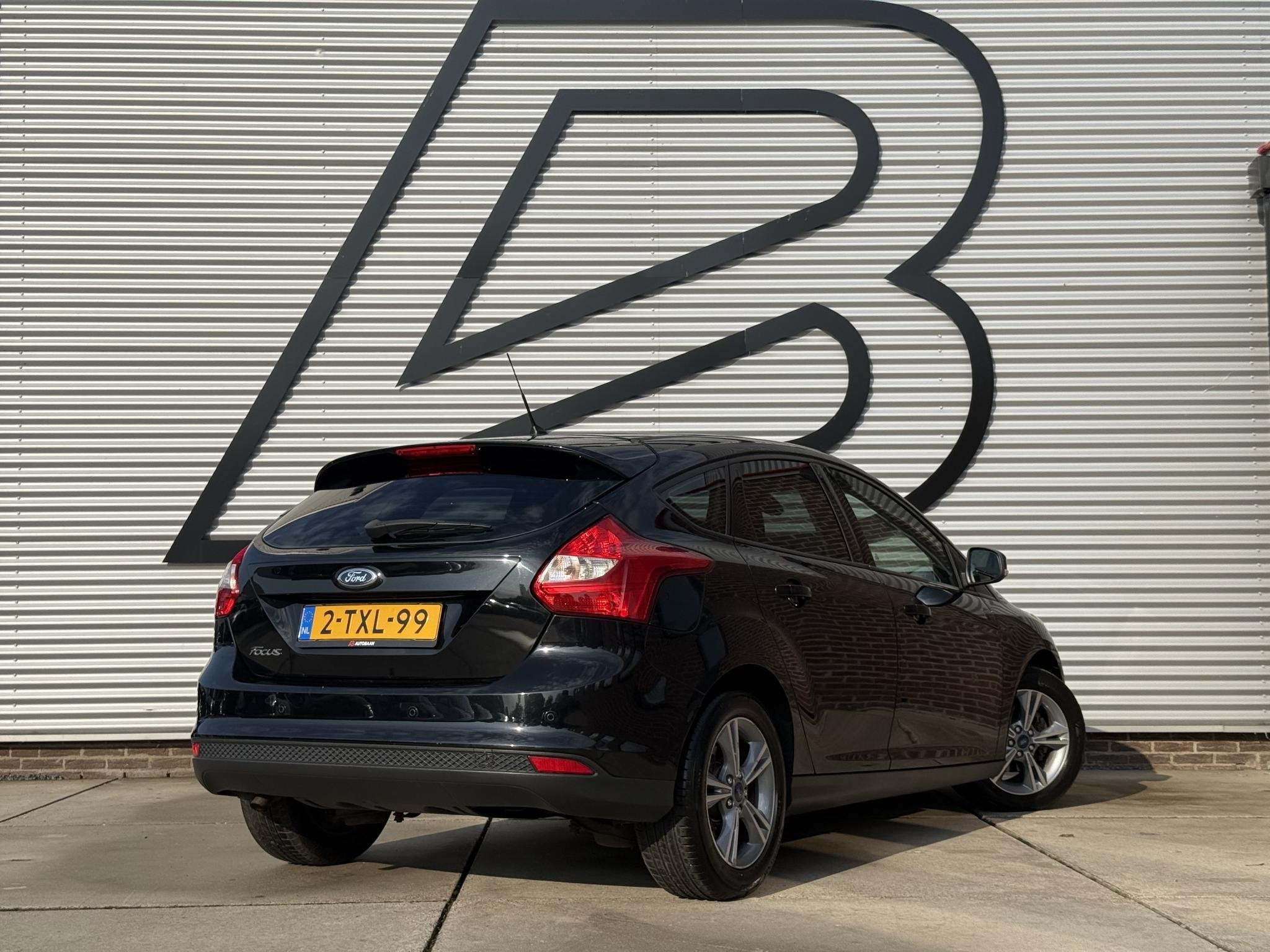 Ford Focus 1.0 EcoBoost Edition 2e Eigenaar|Navi|Airco|Cruis, Auto's, Gebruikt, 635 kg, Zwart, Bedrijf
