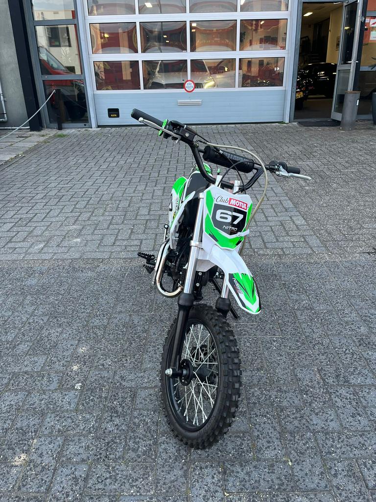 Nitro 125cc schakel crossmotor pitbike + accessoires, Fietsen en Brommers, Brommers | Crossbrommers, 125 cc, Zo goed als nieuw