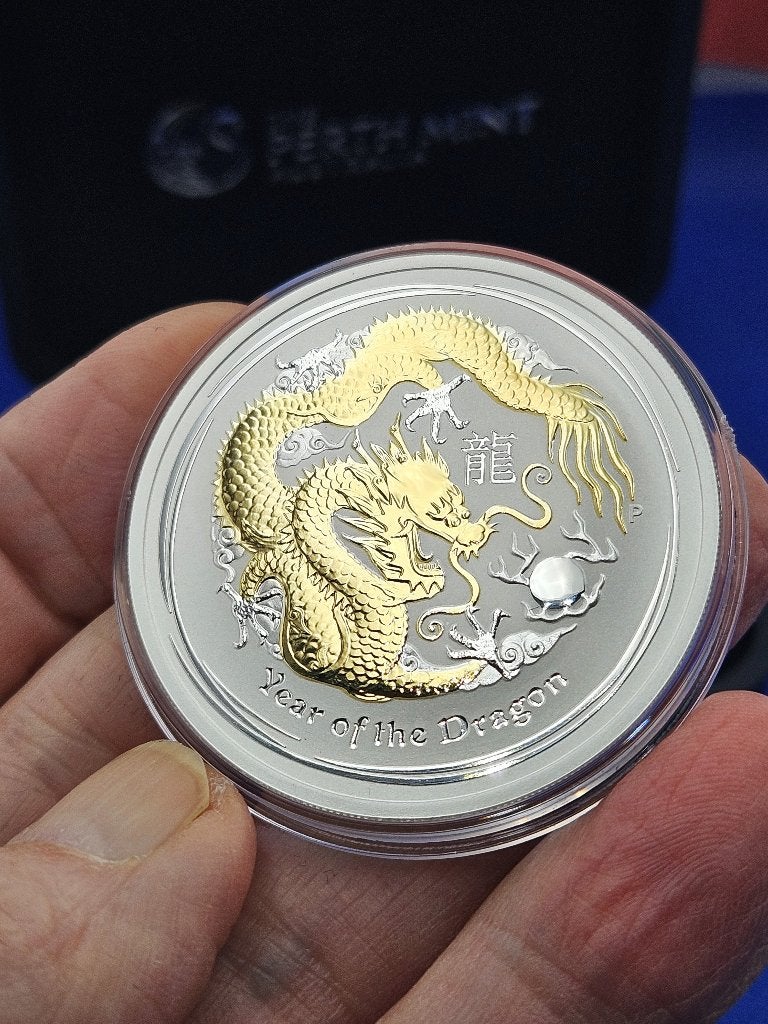 (10720) AUSTRALIA LUNAR II DRAGON GILDED 2012 ONE OUNCE, Ophalen of Verzenden, Zilver