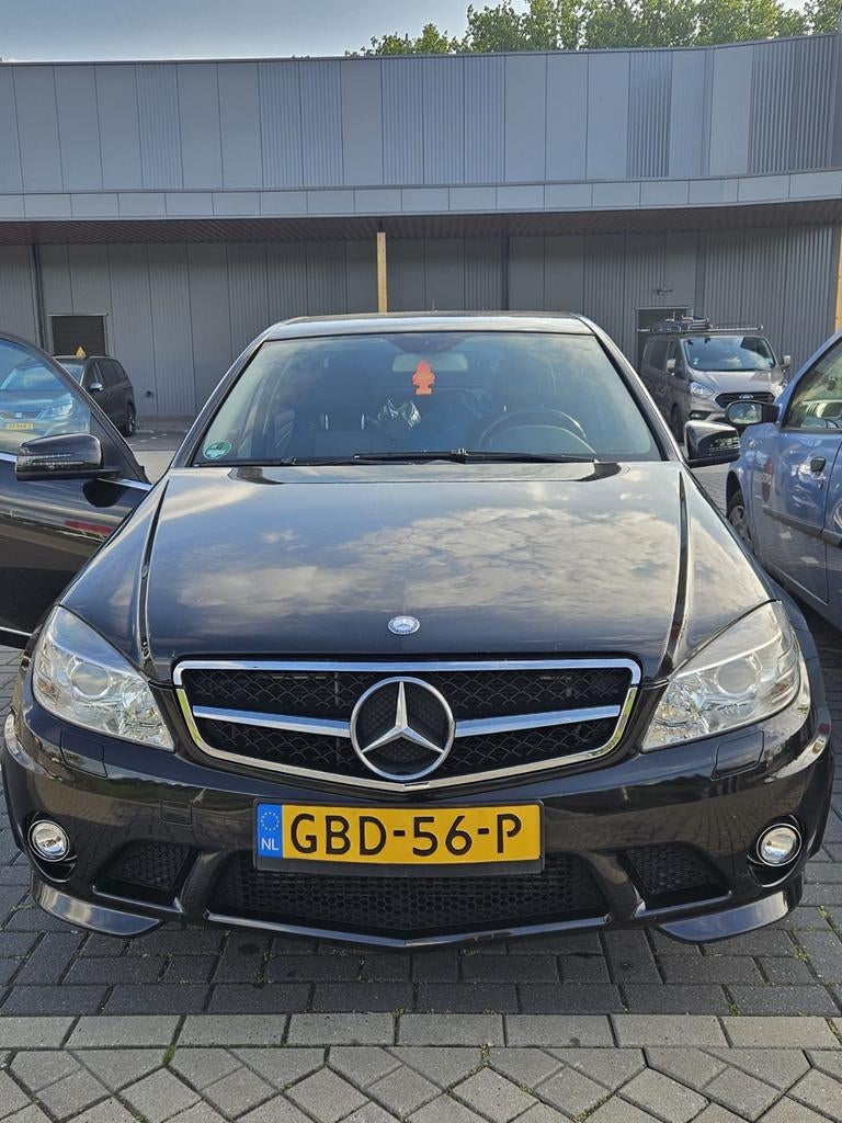 Mercedes-Benz C-Klasse 2.0 C200 CGI Sedan AUT 2010 Zwart, Auto's, Achterwielaandrijving, 1800 kg, 4 cilinders, 1796 cc