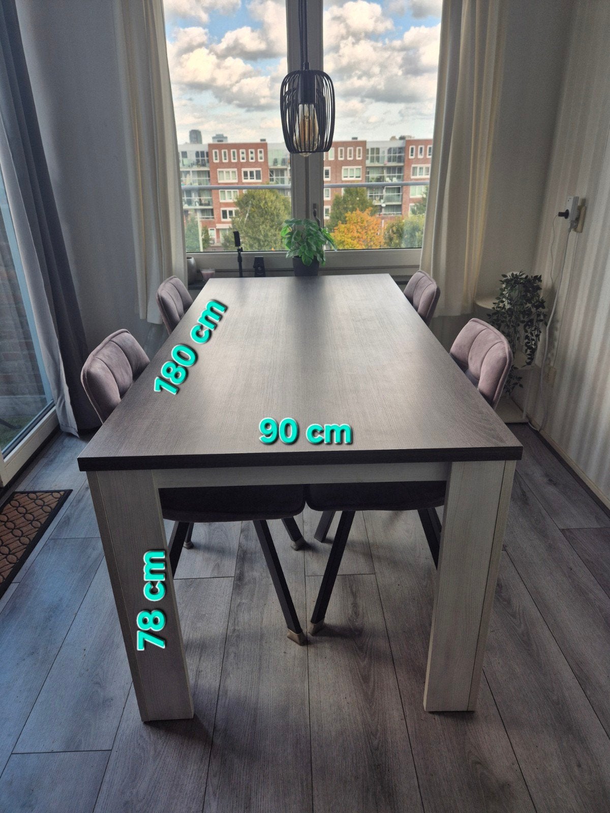 Elegante eettafel met donker blad en lichte poten, Ophalen, 50 tot 100 cm, Zo goed als nieuw, 150 tot 200 cm