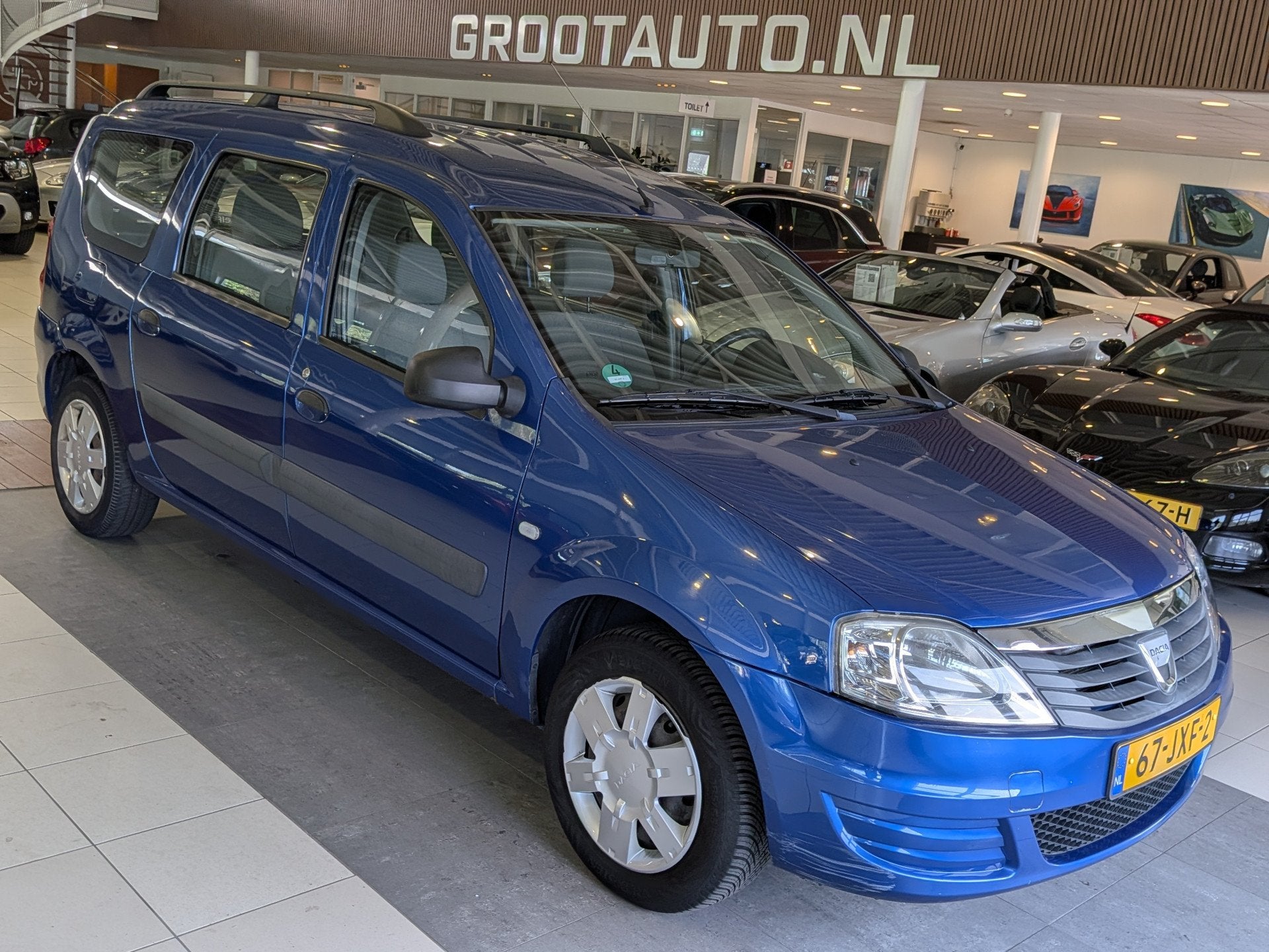 Dacia Logan MCV 1.4 Ambiance Airco, Stuurbekrachtiging, Auto's, Dacia, Stof, Gebruikt, 4 cilinders, Blauw