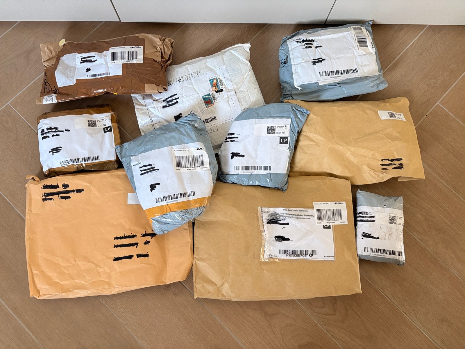 10 geretourneerde pakjes van DHL uit Duitsland, Ophalen of Verzenden, Nieuw