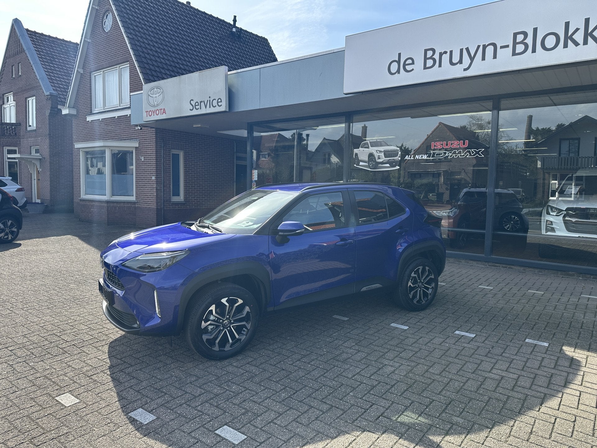 Toyota Yaris Cross 1.5 Hybrid 115 Dynamic Apple Carplay / An, 12 maanden, Gebruikt, Zwart, Blauw