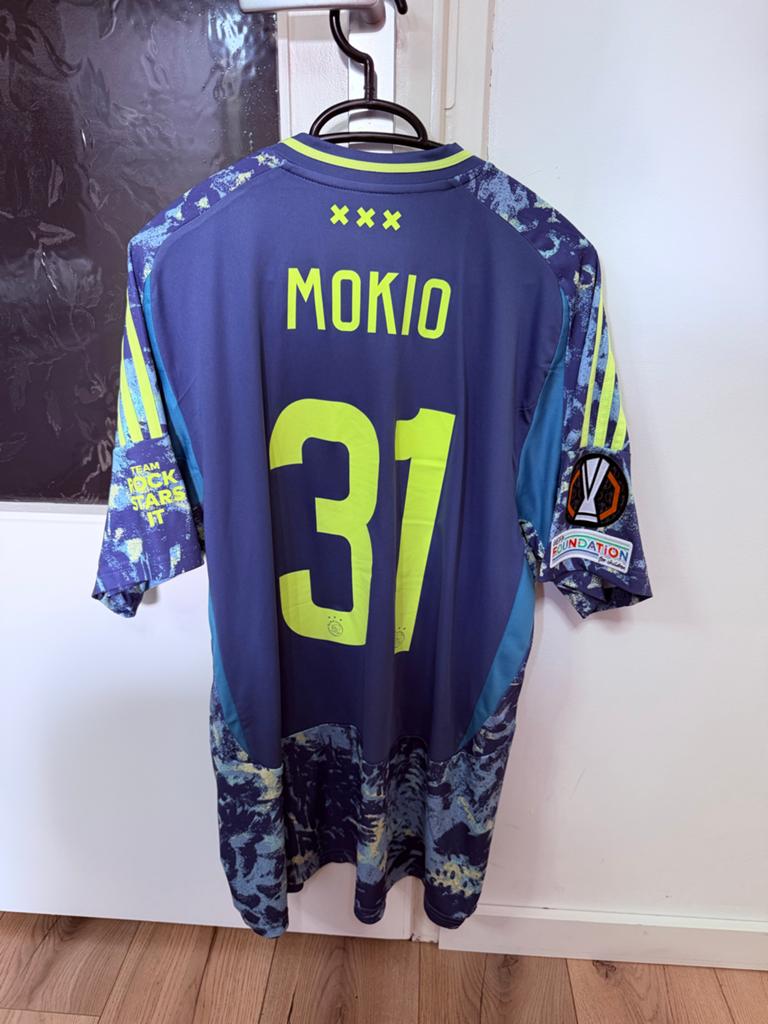 Ajax uitshirt 23/24 Mokio #31 XL Europa League badge, Blauw, Maat 56/58 (XL), Ophalen of Verzenden, Zo goed als nieuw