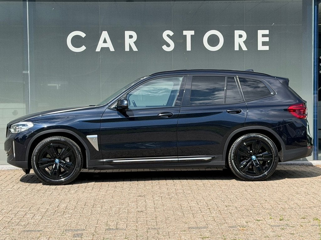 BMW IX3 Executive 80 kWh/PANO/TREKHAAK/1E EIGENAAR/SOH 97.51, Auto's, BMW, Achterwielaandrijving, Gebruikt, 1333 min, Zwart