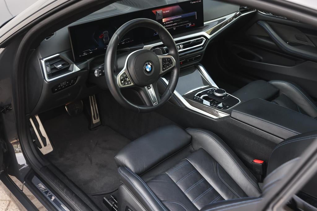 BMW 4 Serie Coupé M440i xDrive High Executive M Sport Autom, Auto's, BMW, Open dak, Euro 6, Met garantie (alle), 4 stoelen
