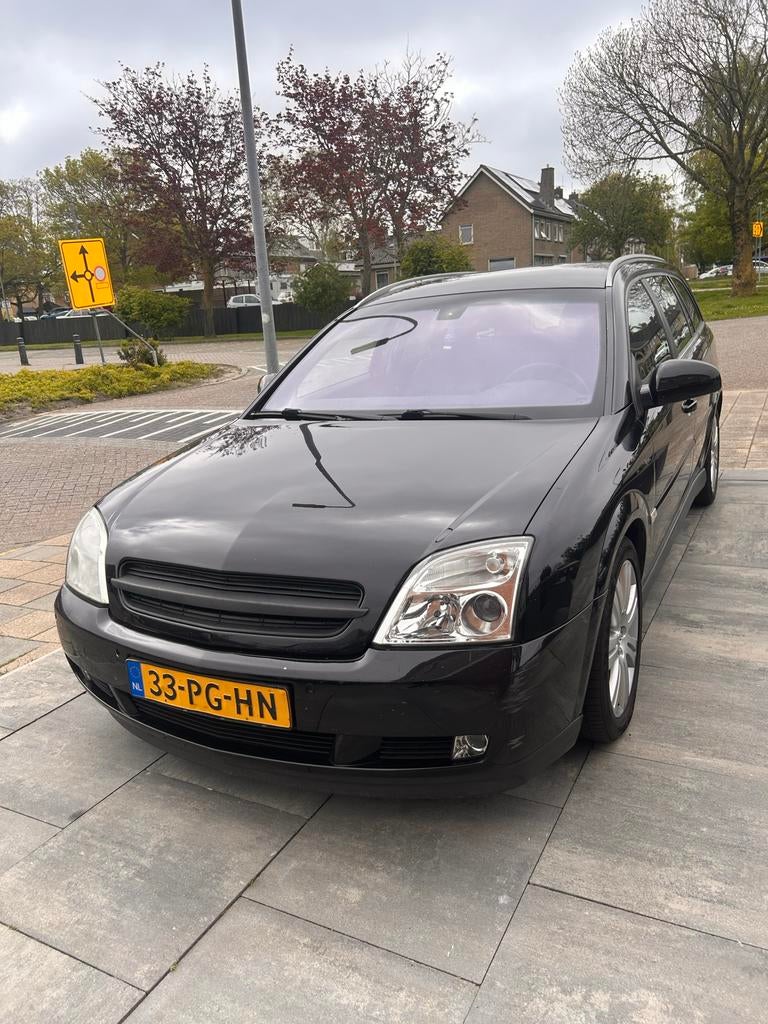 Opel Vectra 3.2 V6 St.wgn. AUT 2004 Zwart NIEUWE APK, Auto's, Opel, 1800 kg, Origineel Nederlands, Particulier, 211 pk