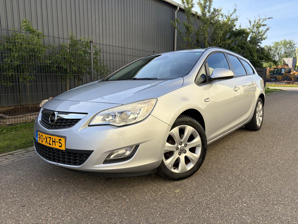 Opel Astra Sports Tourer 1.4 Cosmo / NAVI / AIRCO / CRUISE, Auto's, Voorwielaandrijving, Euro 5, 101 pk, Gebruikt
