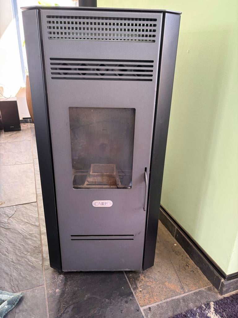 Pelletkachel Caris 7Kw met pijp en opslag, Huis en Inrichting, Kachels, Gebruikt, Overige brandstoffen, Ophalen of Verzenden, Pelletkachel