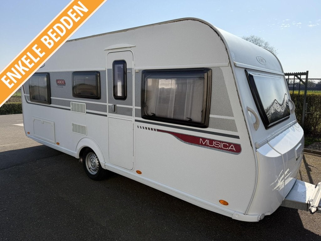 LMC Musica 490 E - Mover - Enkele bedden, Caravans en Kamperen, Rondzit, Bedrijf, Schokbreker, 4 tot 5 meter