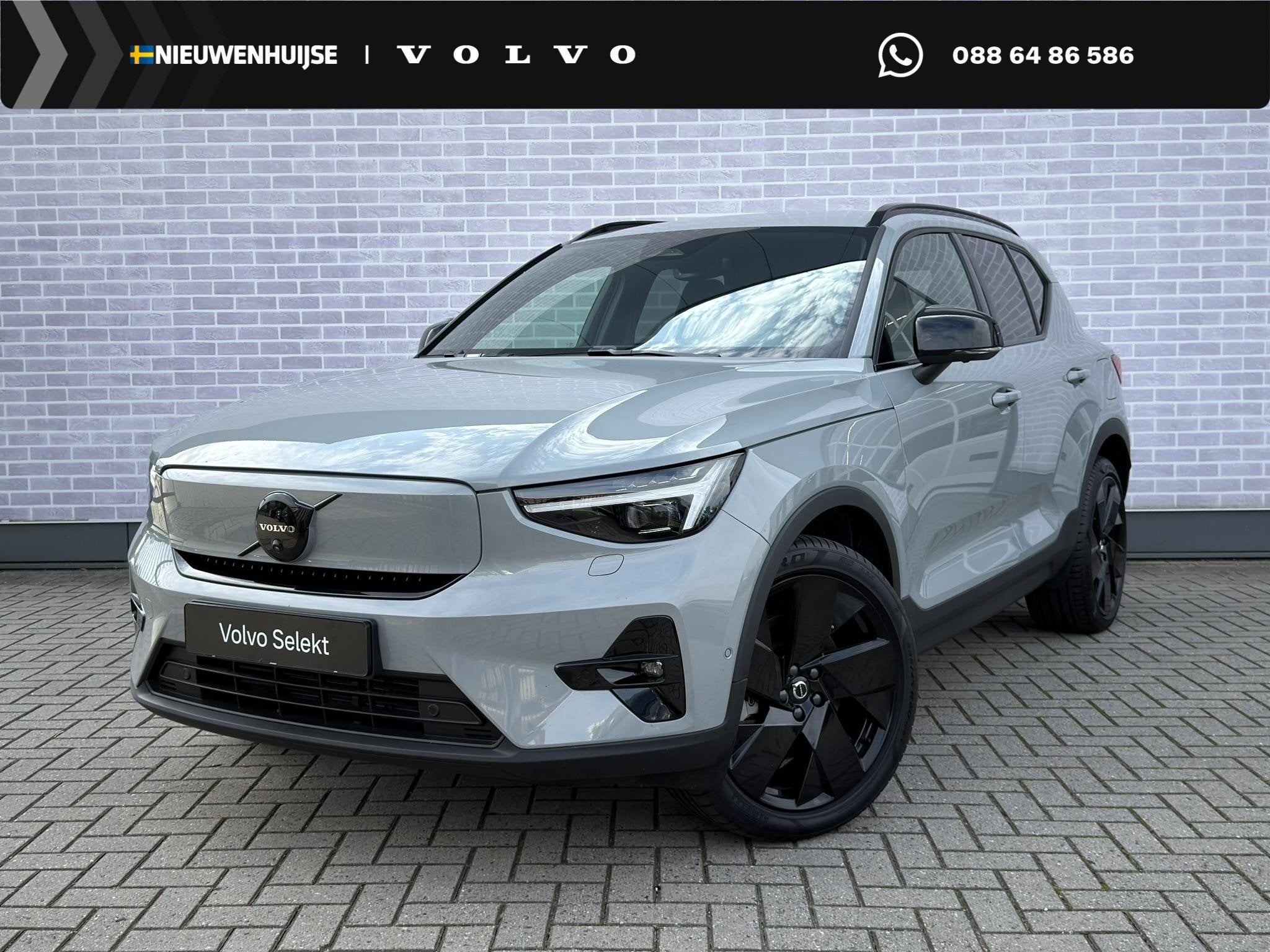 Volvo EX40 Single Motor Extended Range Plus Black Ed. 82 kWh, Auto's, Gebruikt, Automatische klimaatregeling, 1975 kg, SUV of Terreinwagen